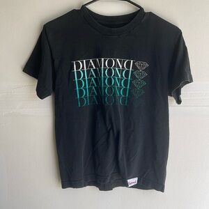 Brand is diamond by Tillys. Size medium. 100% cotton.